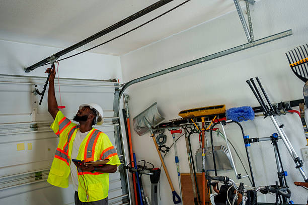 Professional Garage Door Panel Replacement technician working in Montgomery County County, MS